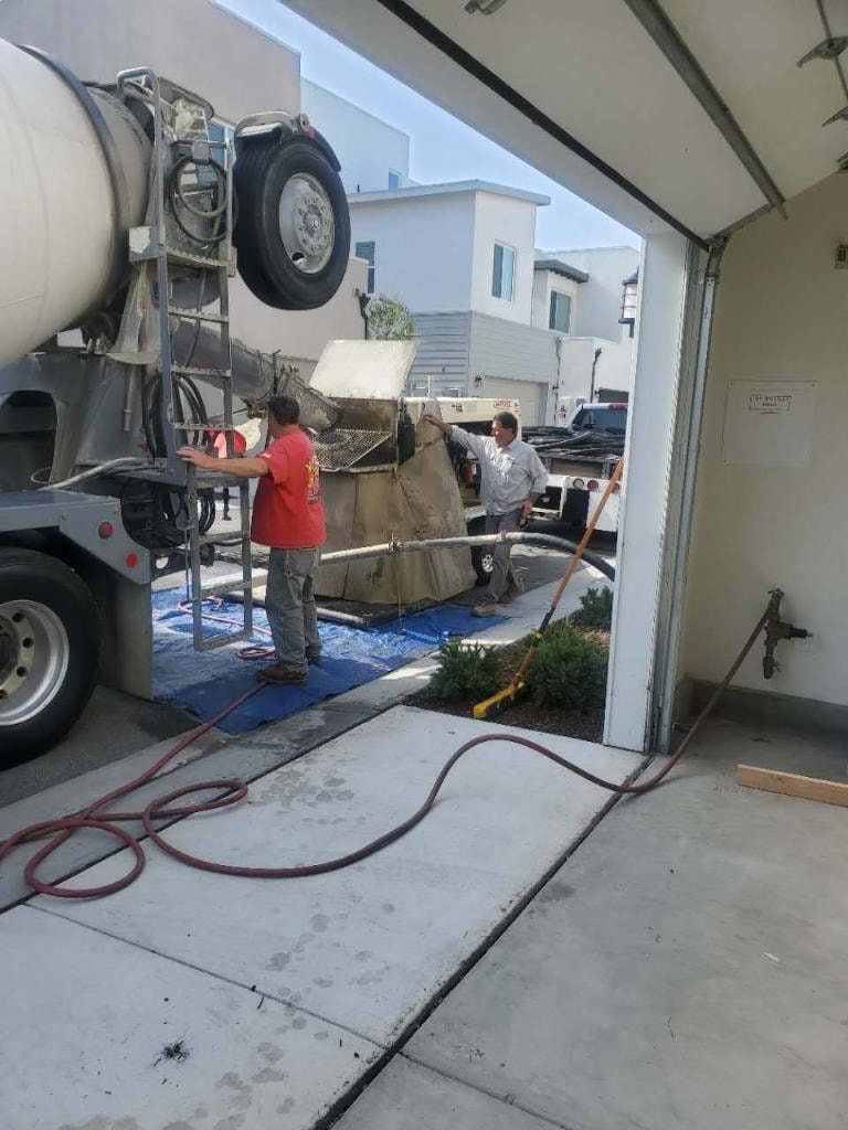 Concrete truck delivery and garage floor pour — Irvine CA