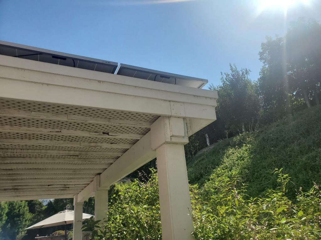 Original deteriorated white lattice patio cover exterior view — Orange County CA