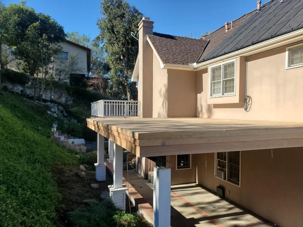 Finished white painted column with new base and patio cover structure — Orange County CA